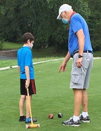 Volunteering camp instruction of croquet at The Springs Croquet Club